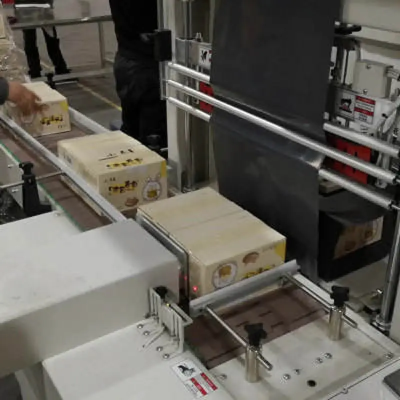 Bread box shrink wrapping packaging machine
