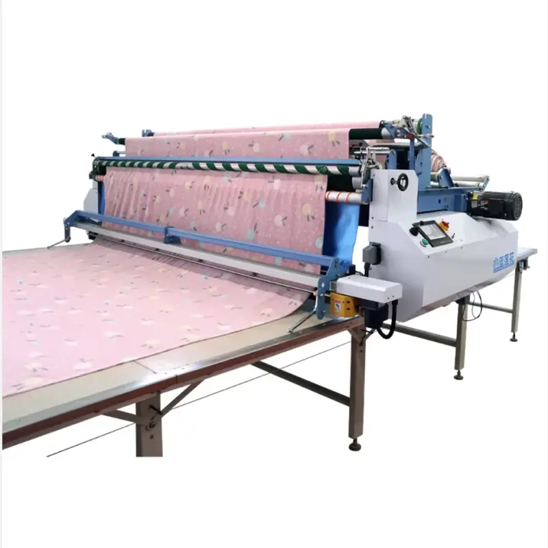 High spread fabric and cutting table apparel machinery