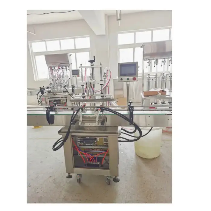 4 Heads Automatic Vacuum Liquid Filling Machine 50 Bpm