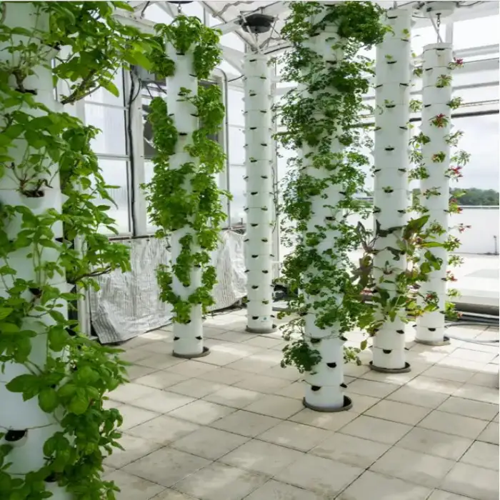 Rotating tower vegetable growing tower hydroponic farm with LED growing light with frame Vertical hydroponic system