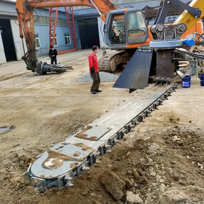 Railway excavator with ballast undercutter removes fouled ballast from underneath the railway track