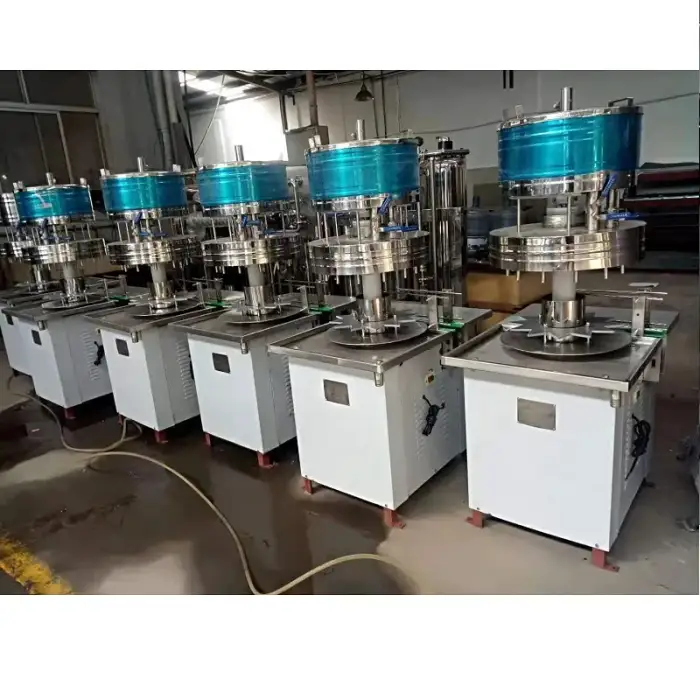 Manual Rotary Gravity Liquid Filling machine with Auto Capping machine Low Cost High Efficiency