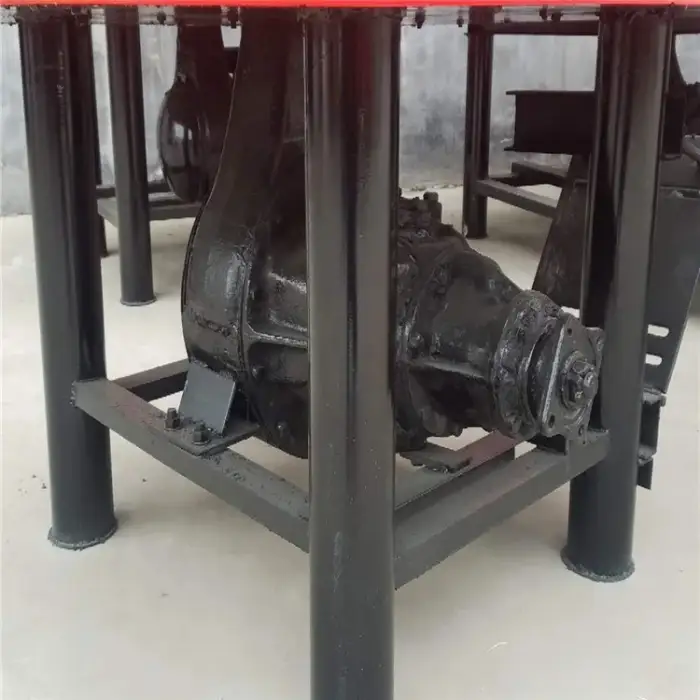 Vertical self loading concrete pan mixer