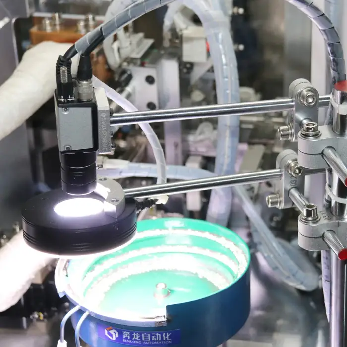 Low-voltage magnetron switch automated assembly and testing flexible production line