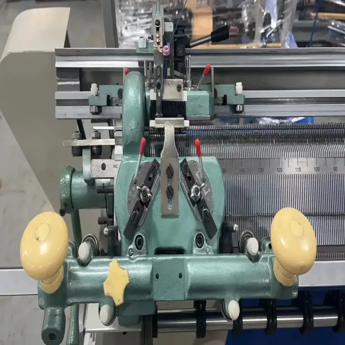 Semi automatic knitting machine for making jersey sweater