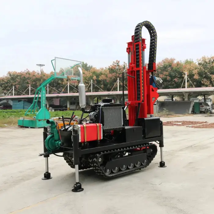 Dual power head water well drilling rig