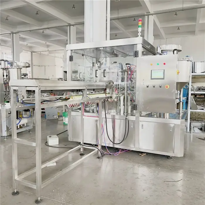 Industrial Stand-Up Pouch Filling and Capping Machine - Ideal for Sauces, Beverages, and Personal Care Products