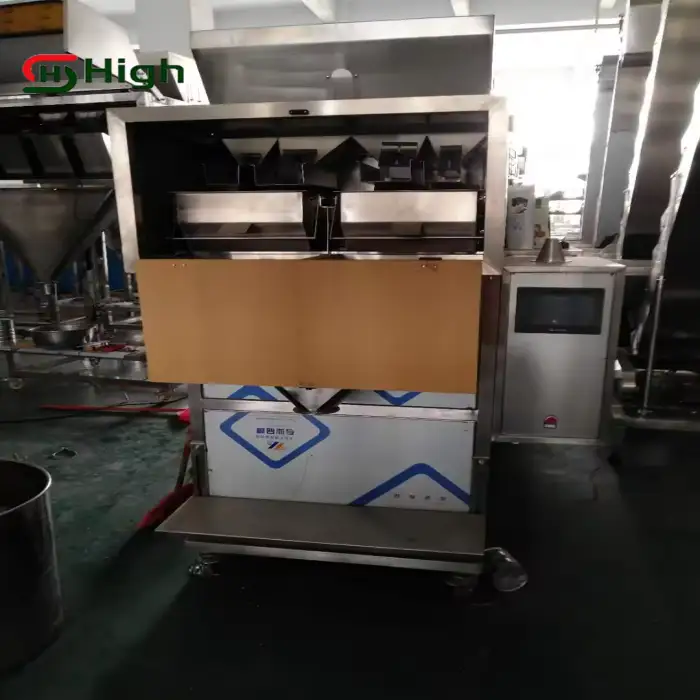 Semi-Automatic Dual Head Vibratory Filler Grain Machine PLC Controlled for Pistachio & Coffee Beans for Glass Packaging