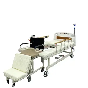 Low home care bed with wheelchair separation and toilet function for family use