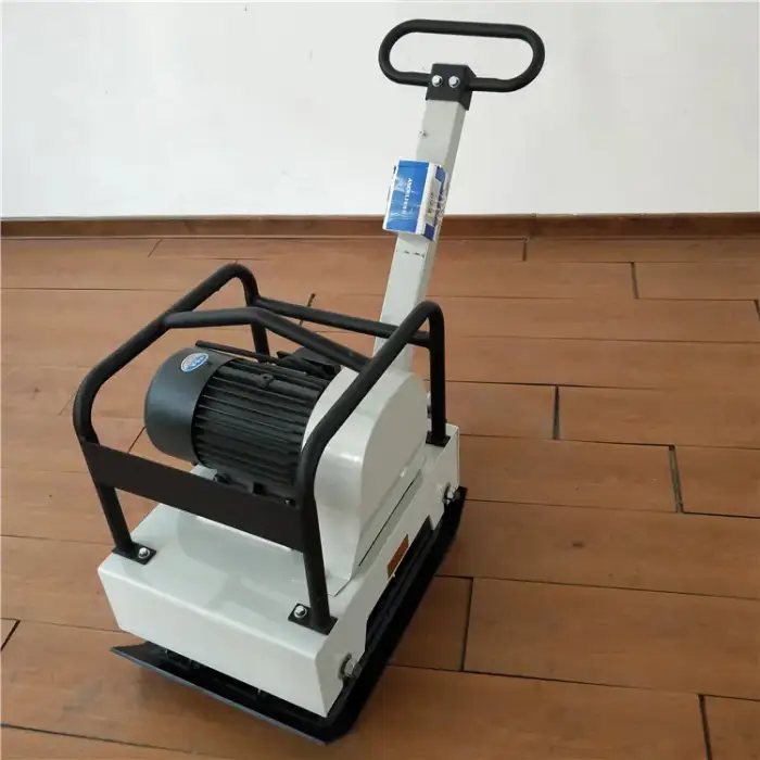 handheld reversible vibratory plate compactor for road construction work